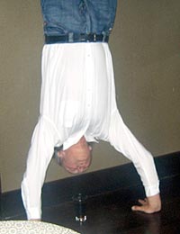 Erik the fearless Dane does the perfect handstand and downs a large Jack Daniels in one.